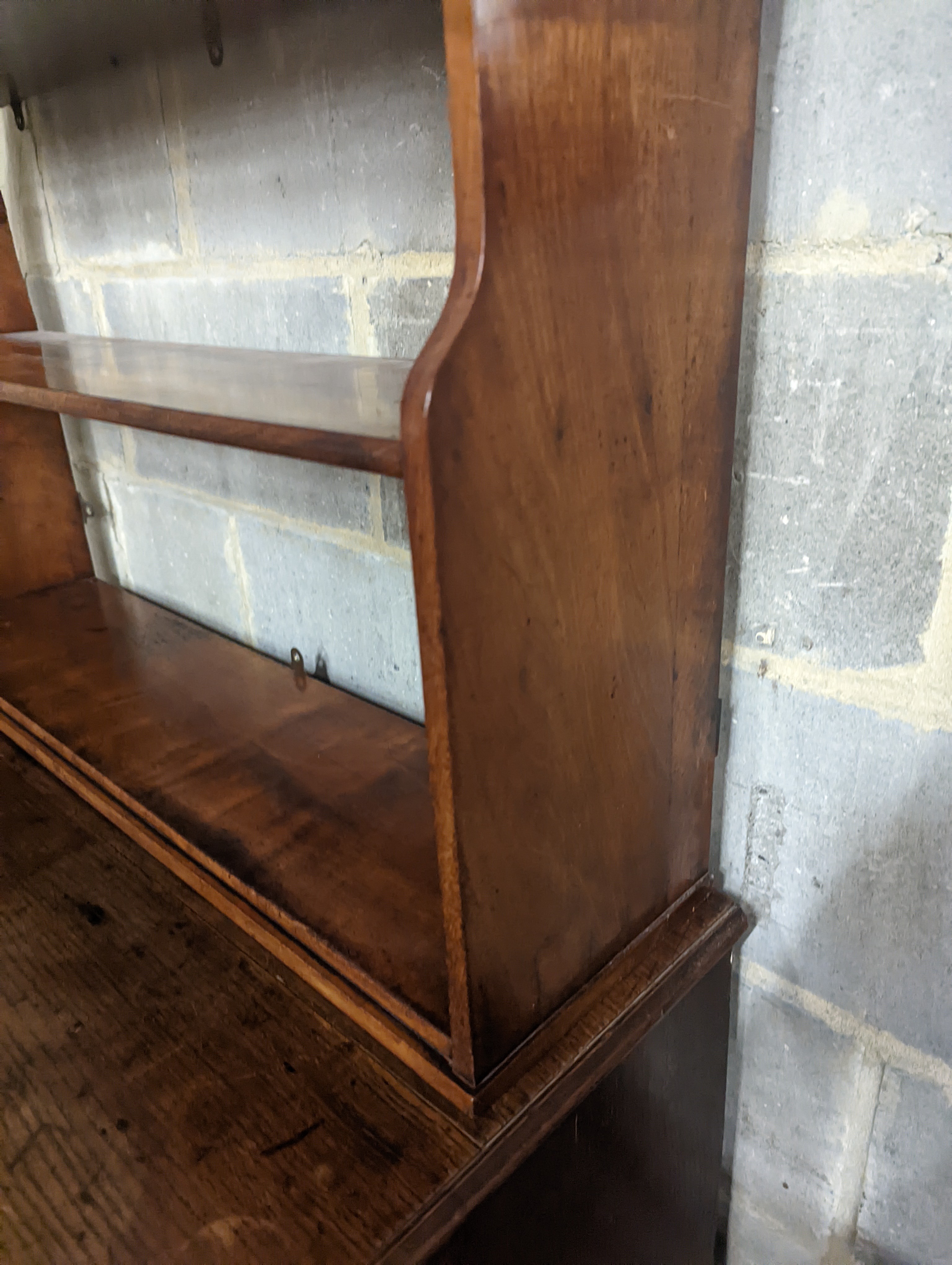 A Victorian mahogany wall bracket. W-90cm, D-22cm, H-70cm.
